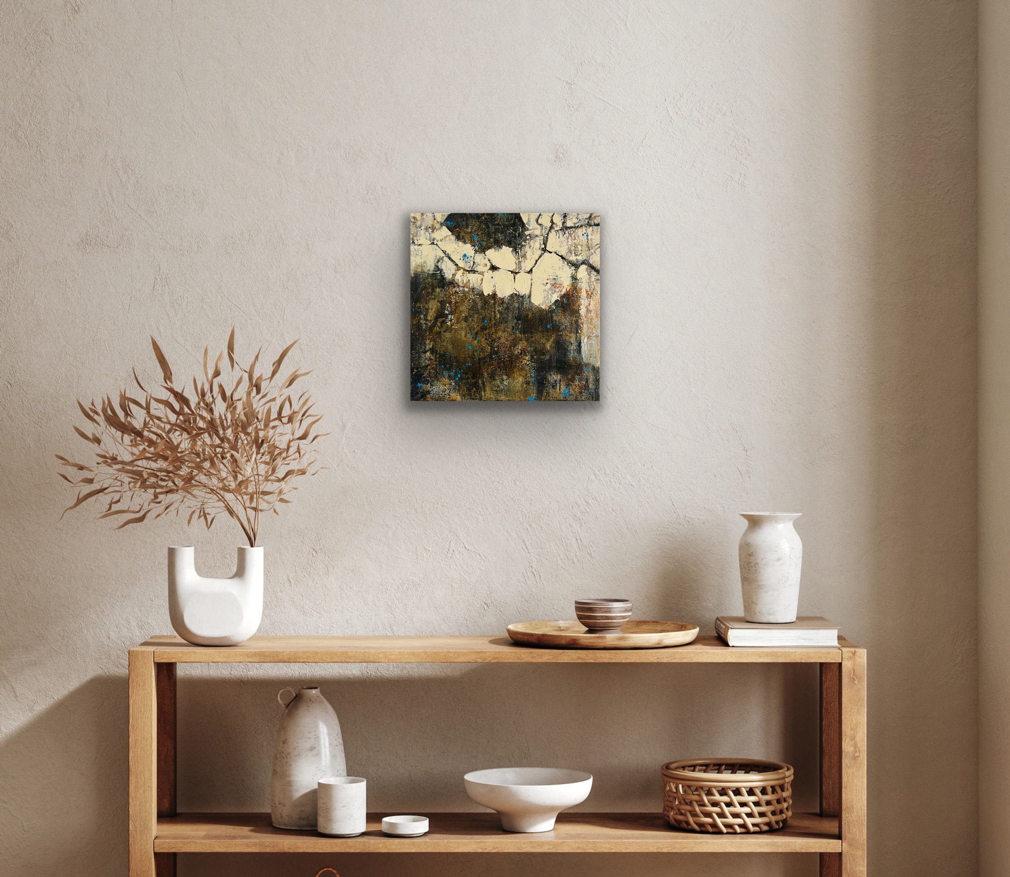 A small black, cream and gold painting about a shelf with ornaments