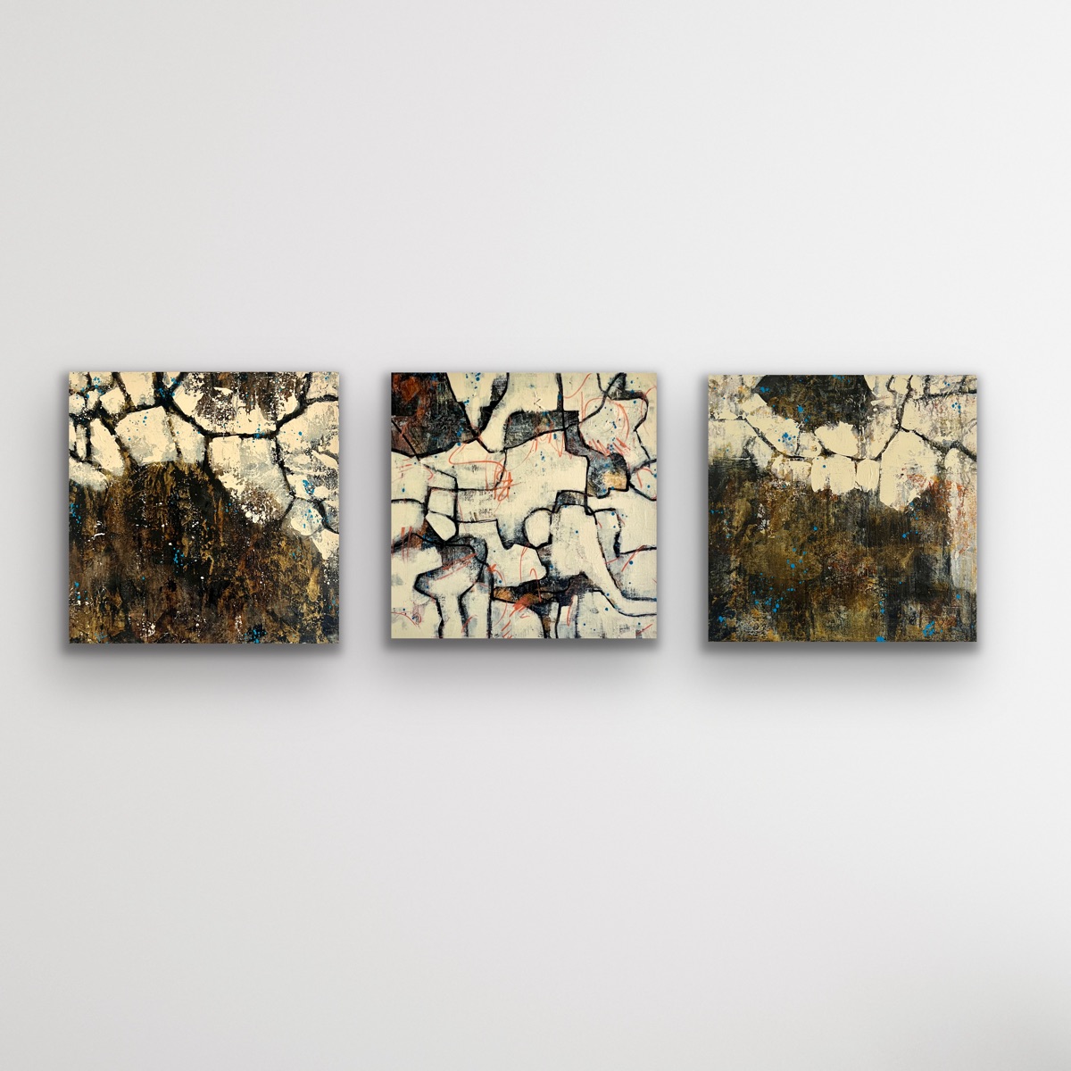 Three small abstract paintings together
