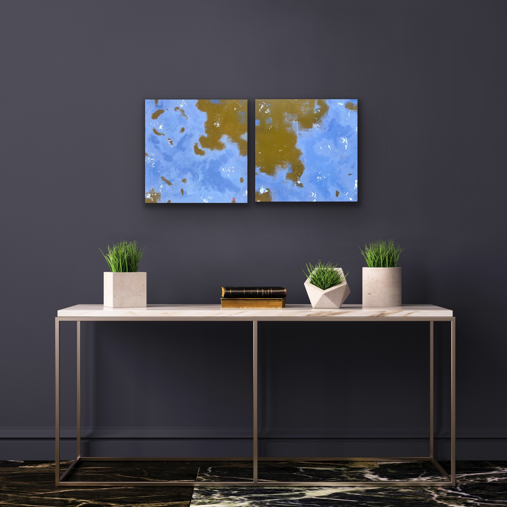 Two small blue paintings together