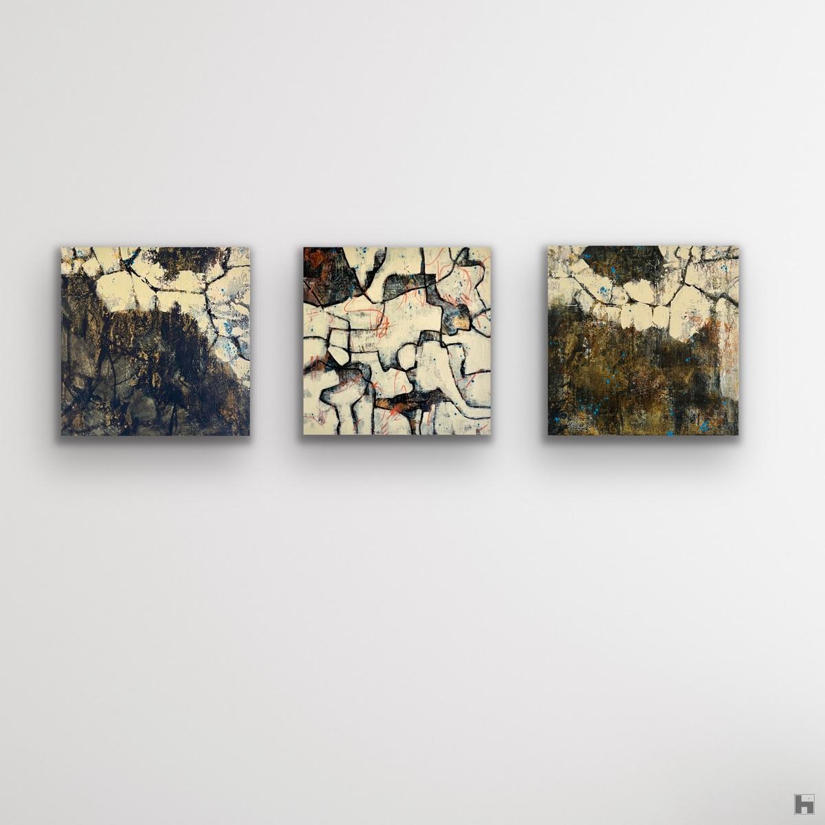 Three small paintings together on a white wall