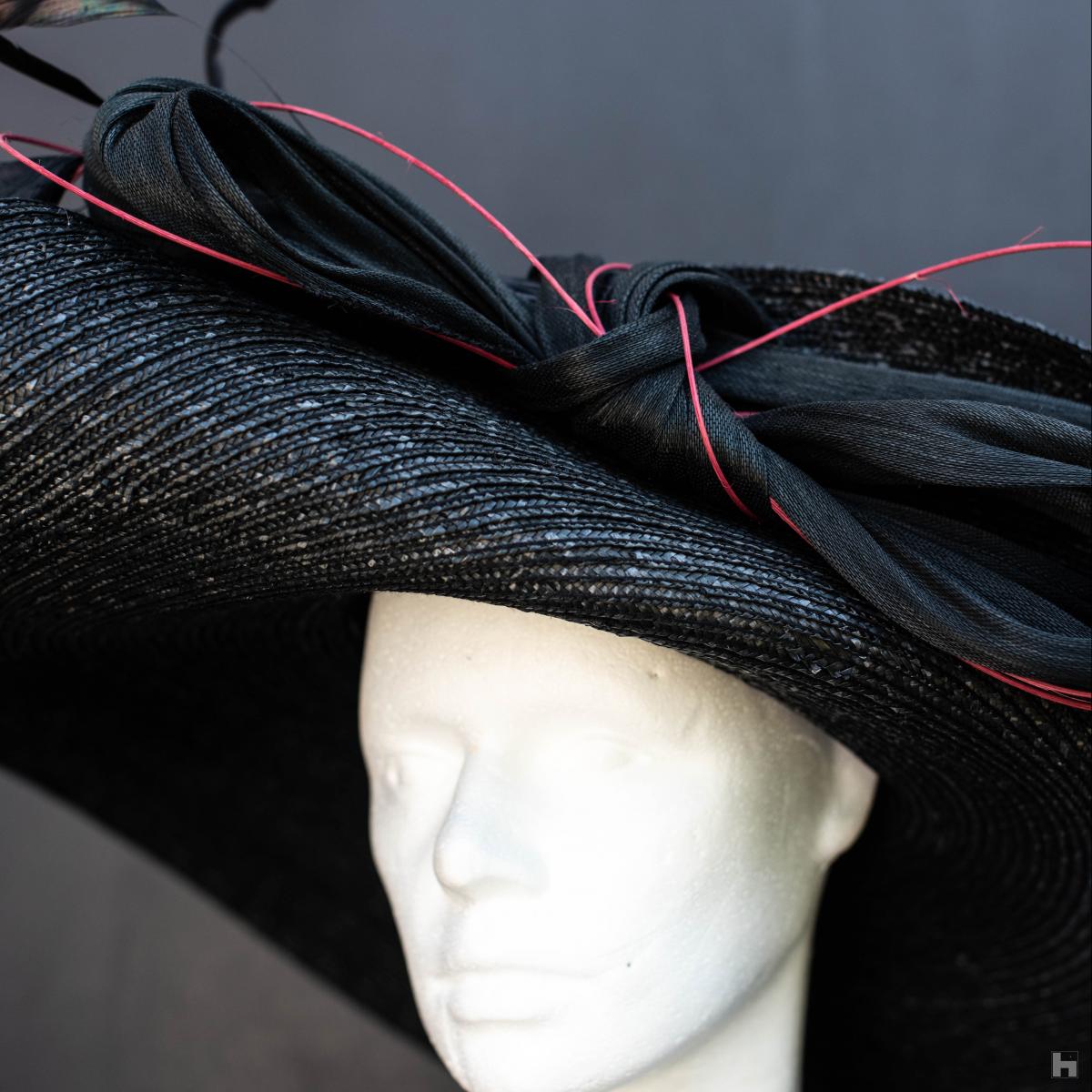 This hat is a unique piece designed and made by hand in straw sewn in our workshops in Belgium.
