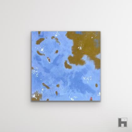 A photo of a square painting in pale blue hung on a white background